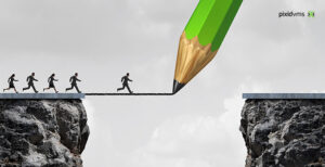 Surreal image of workers crossing a bridge between two cliffs, but the bridge is created by a magic green pencil and the pencil marking is the bridge on which they walk to the other side. It is not yet complete - so a gap is still there but being closed by the pencil. There is a Pixid VMS logo on the image,